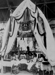 The Zetland and Fair Isle knitters at The International Exhibition in 1886. Photograph courtesy of The Shetland Museum.